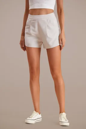 Beige Shorts mit hoher Taille und Taschen